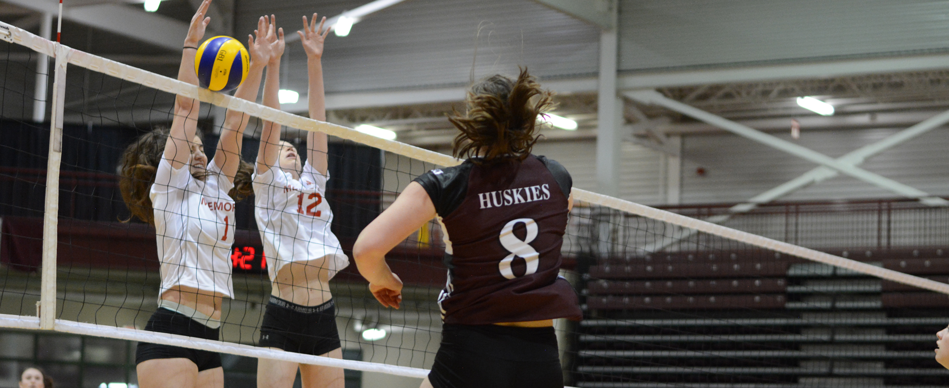 Huskies Prevail in Four Set Match